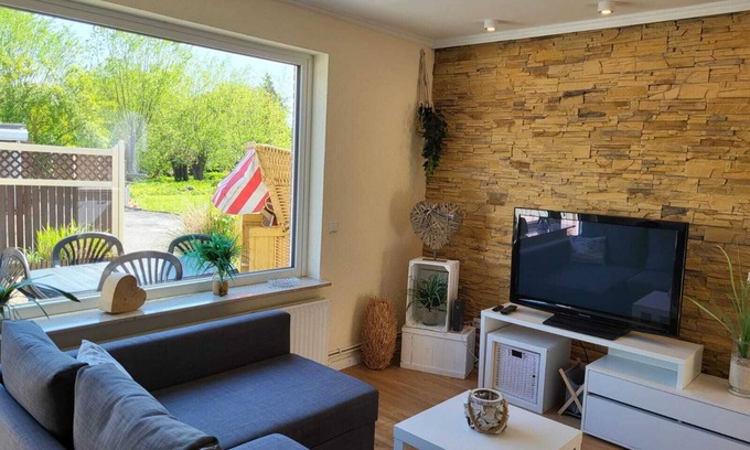 Alt-Travemunde/Ronnau Apartment | Apartment in Travemünde with a central location, terrace and beach chair