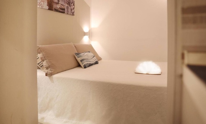Sassari Apartment | Apartment 'La Corte Di Santa Maria' with Wi-Fi and Air Conditioning