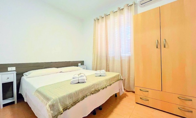 Montincello Apartment | Apartment 'La Mignola - Quadri 6' with Private Terrace, Wi-Fi and Air Conditioning