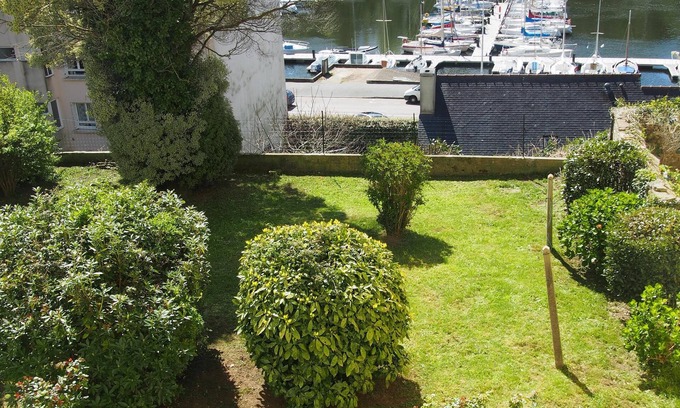 Douarnenez Apartment | apartment overlooking garden and sailboats