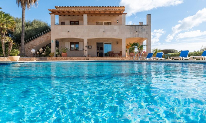 Cala Santany Apartment | Apartment 'Residencial Planta Baja Vista Mar' with Sea View, Shared Pool and Wi-Fi