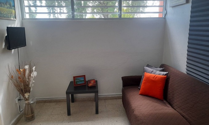 Cangrejo Arriba Apartment | Apartment steps from Isla Verde airport