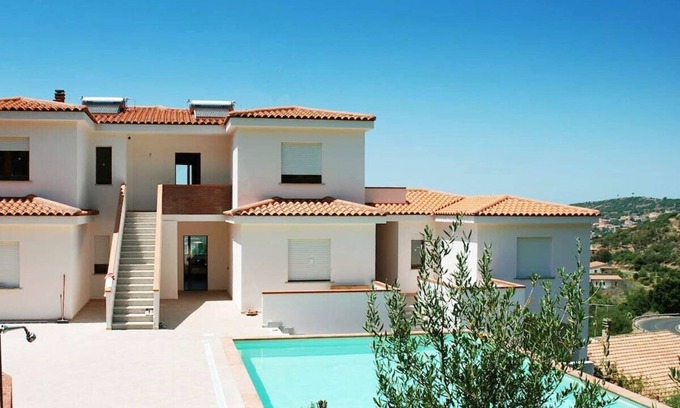Badesi Apartment | Apartment Suono del Blu in charming residence with the pool in Badesi