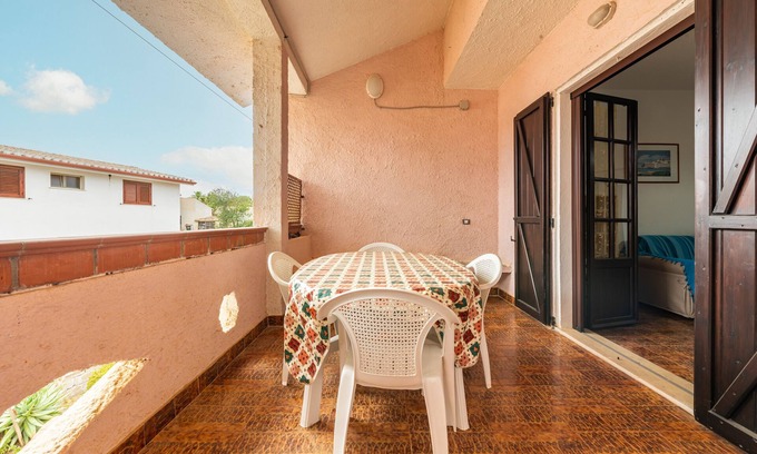 Porto Pino Apartment | Apartment 'Villa Mascia A' with Private Terrace and Air Conditioning