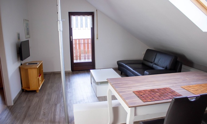 Hillesheim Apartment | Apartment with a covered south-facing balcony