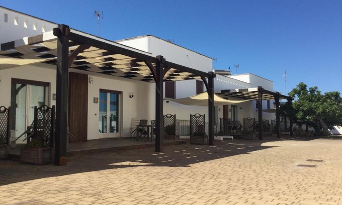 Posto Rosso House | Appartamenti a 50 mt dal mare a Posto Rosso