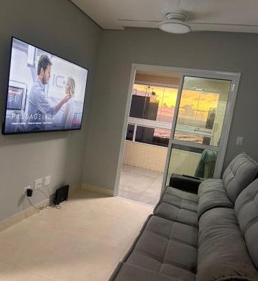Real Apartment | APTO BEIRA MAR - ACONCHEGANTE VARANDA GOURMET - WIFI - NETFLIX - TV A CABO - PRAIA GRANDE