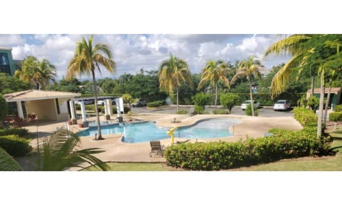 Mediania Alta Apartment | AQUATIKA 1ST FLOOR /NO STAIRS /POOLFRONT FAMILY & PET FRIENDLY BEACH APARTMENT