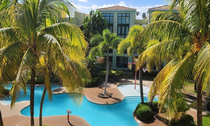 Mediania Alta Apartment | Aquatika Seashell Retreat/Beach/pools/king Bed/20 mins El Yunque