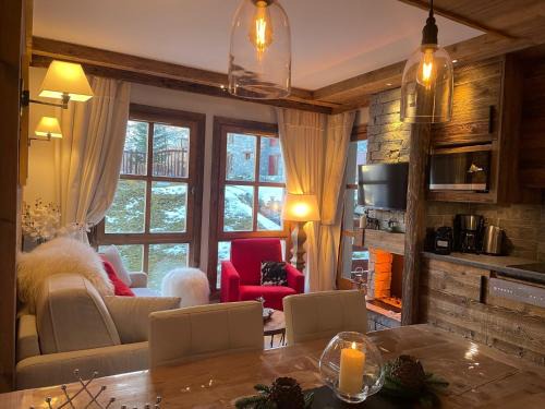 Arc-1950 Apartment | Arc 1950 appt luxe 2-4pers -skis aux pieds-SPA-piscines intérieure et extérieure-sauna-hammam