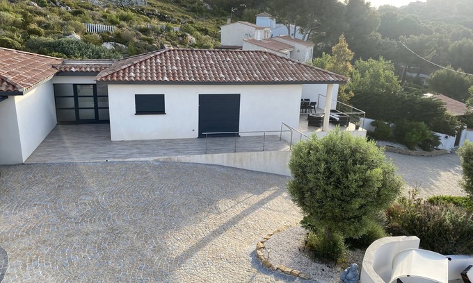 Ensues-la-Redonne House | architect-designed villa on private estate. Swimming pool open with dates and times.