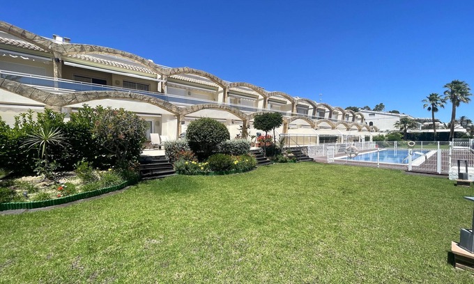 Miami Platja House | ARCOS casa adosado primera línea