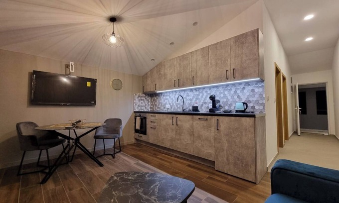 Golubovci Apartment | Art deco-inspired apartment in a quiet area near the Airport