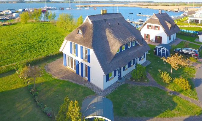 Monchgut-Granitz House | At the sailing harbor, terrace, garden, sea view - vacation home Boddentraum Abendrot