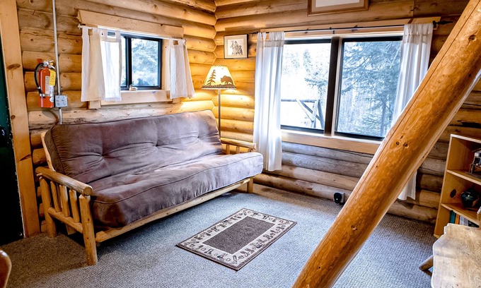 Bigfork Cabin | Atmospheric woodland cabin with firepit, near Glacier & Flathead Lake