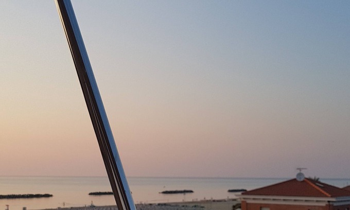 Porto San Giorgio Apartment | Attic room by the sea