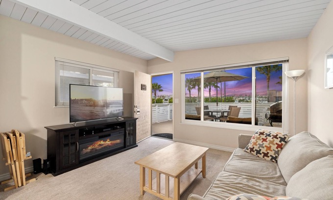 Balboa Peninsula Apartment | Backyard Beach! 50 Steps to the Sand with Bay Views and Ocean Blues