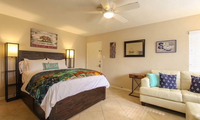 Balboa Peninsula Apartment | "Balboa Beach Escape" Steps to Beach and Bay A/C + Garage Parking