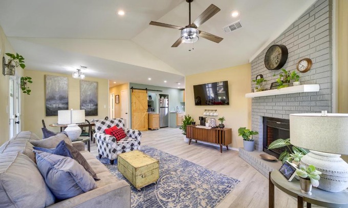 Barling House | Barling Vacation Rental Fenced-In Yard with Hot Tub