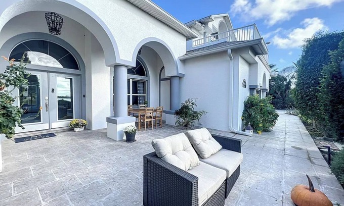 Merritt Island Villa | Barrier island water front luxury villa w dock near beaches and Disney Orlando