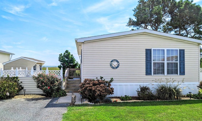 Assateague Pointe House | Bay-view manufactured retreat 2 pools, basketball & volleyball courts