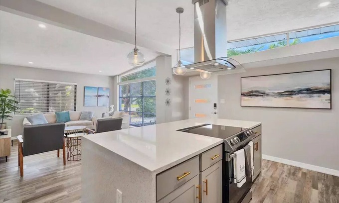 Bayshore Gardens House | Bayshore Gardens remodel with hot tub + fire pit + walk to park and marina