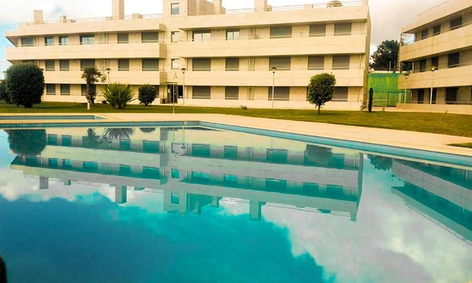 Viana do Castelo Apartment | BEACH FRONT APARTMENT - with swimming pool, barbecue and tennis court!