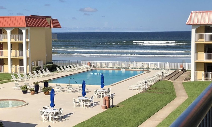 Point East Condo | Beach front condo with ocean views and community pool. 2/2 on non drive beach.