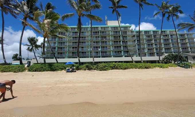 Punaluu Condo | Beach Front Condo w/Beautiful Sunrises on Private Sandy Beach with Calm & Gentle Waves