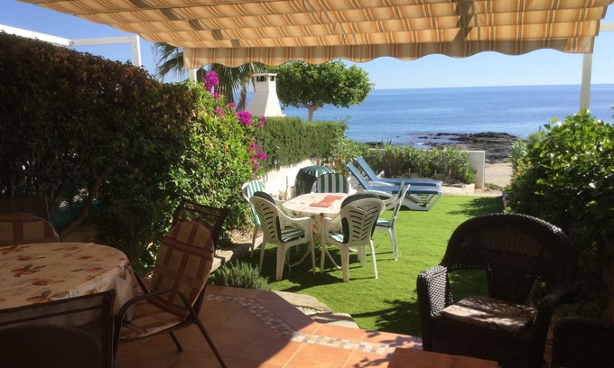 Cala Panizo House | Beach front 3 double bedroom house, pool, pets, garden 40' from sea. NEW BBC ITV