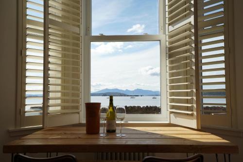 Fairlie Apartment | Beach house no2 with amazing sea views and private garden onto beach.