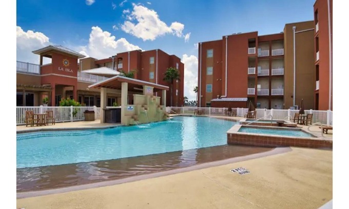 South Padre Island Condo | Beach Side - Heated Pool Paradise w/BBQ Grill