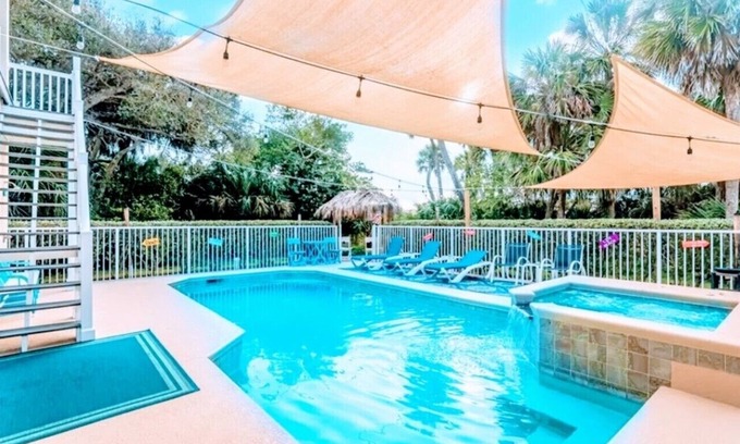 North Beach House | Beach side paradise,Walk to beach Beach,heated pool &hot tub .Total Privacy