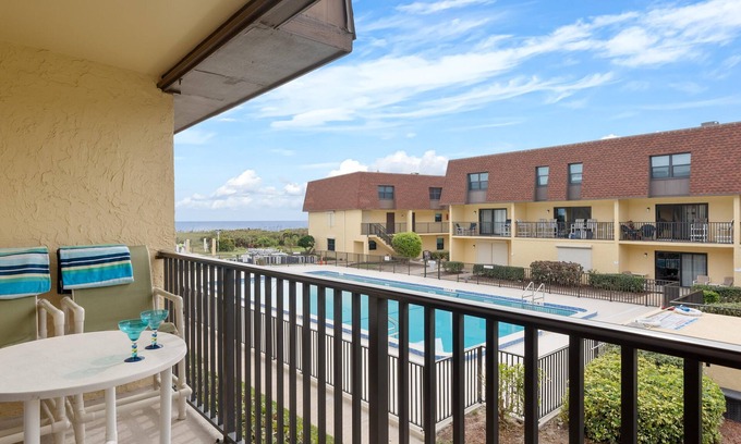 Avon By The Sea Condo | Beachfront 2BR Condo W/Pool BBQ & Steps To Beach Close to Space Center and Dini