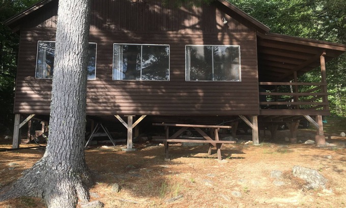 Millinocket Cabin | Beachfront Cottage on Ambajejus Lake With Sandy Beach and a Mountain View
