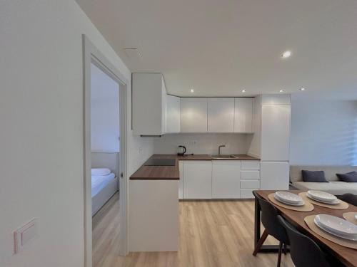 Comarruga Apartment | Beachfront Seaside Serenity