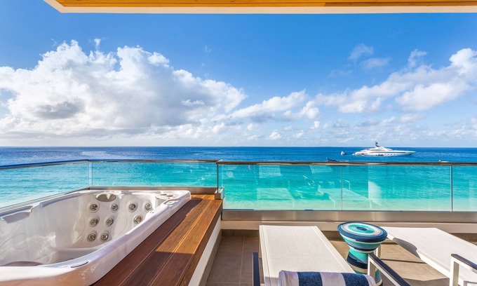 West End Village Villa | BEACHFRONT PENTHOUSE VILLA AT AWARD-WINNING BOUTIQUE RESORT ON MEADS BAY BEACH