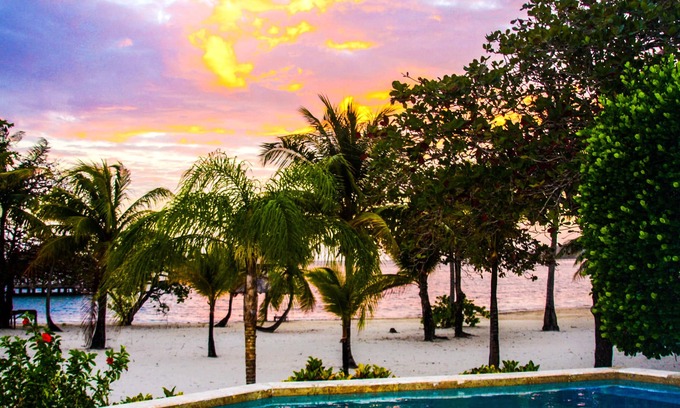Palmetto Bay Villa | Beachfront, Private Pool, Bar & Restaurant, Dive Shop, Gated Beach Resort.