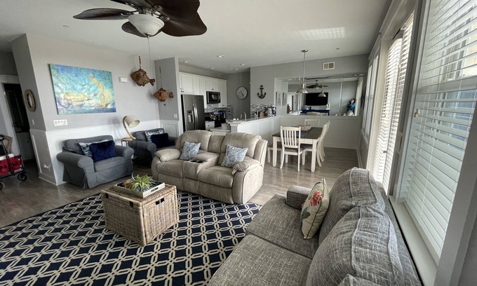 Red Fish Cove Condo | Beachfront, top floor condo steps away from Pointe West Beach Club and beaches.
