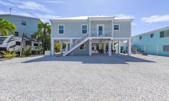 Breezeswept Beach Estates House | Beautiful 3 bed 2 bath canalfront home with great boating access
