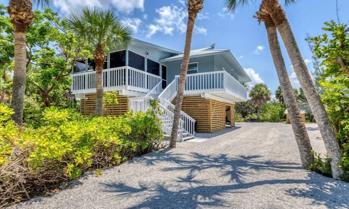 Palm Island House | Beautiful 4-bedroom beach home with dock on private island.