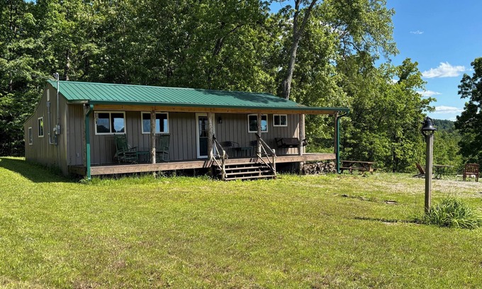 Mount Vernon Cabin | Beautiful Cabin Nestled in a Peaceful Wooded Setting with a Scenic Pond.
