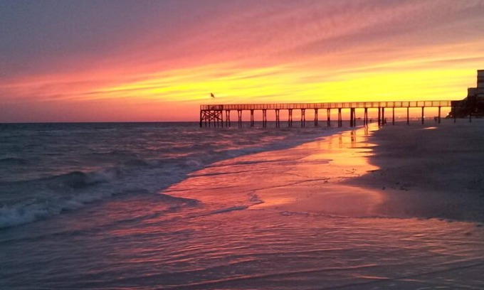Redington Beach Condo | Beautiful Condo on Miles of White Sand Beach. Watch Dolphins from your bedroom!