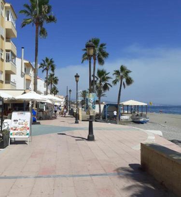San Luis de Sabinillas Apartment | Beautiful Beachfront Newly Renovated 2 Bedroom Apartment with Swimming Pool and Garden