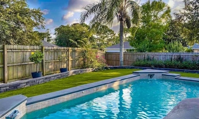 Titusville House | Beautiful heated pool home with office in Florida
