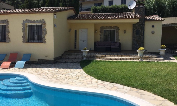Calonge House | Beautiful house surrounded by an idyllic garden with salt water pool.