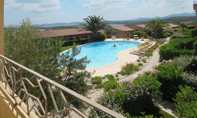 Porto Pozzo Apartment | Beautiful apartment for 4 guests with pool, WIFI, A/C, TV, terrace, pets allowed and parking