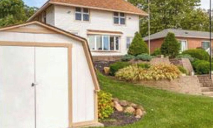 Onsted House | Beautiful lakehouse directly on all sports lake. Stunning views!58ft frontage.