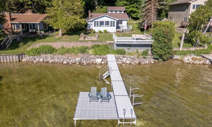 Traverse City Cottage | Beautiful Leelanau County cottage & guest bunkhouse on 75' of waterfront.