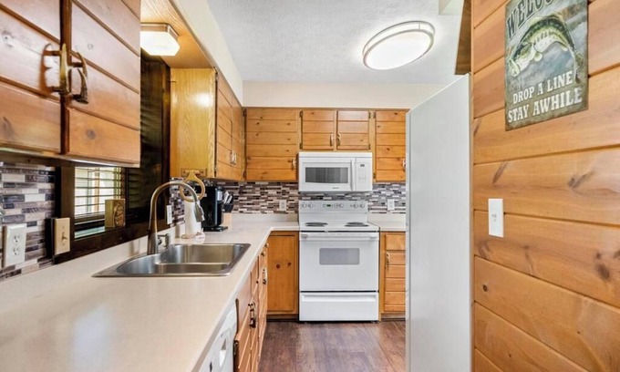 Alanson House | Beautiful Log Cabin on the River with Hot Tub